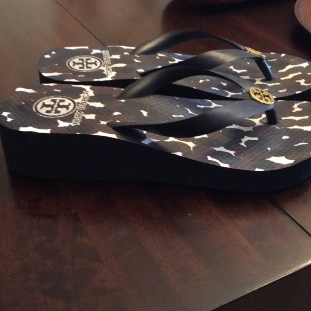 Tory Burch black and Gold flip flops
